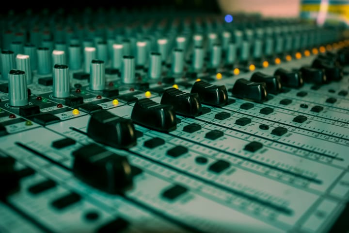 Image shows various knobs on a sound control board